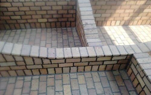 Acid proof clay brick lining inside a tank