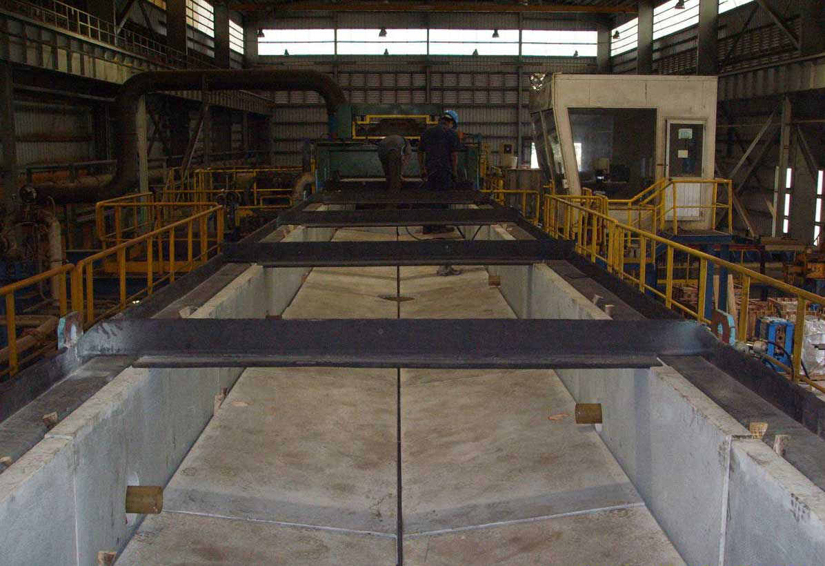 Sealant application on granite pickling tank blocks